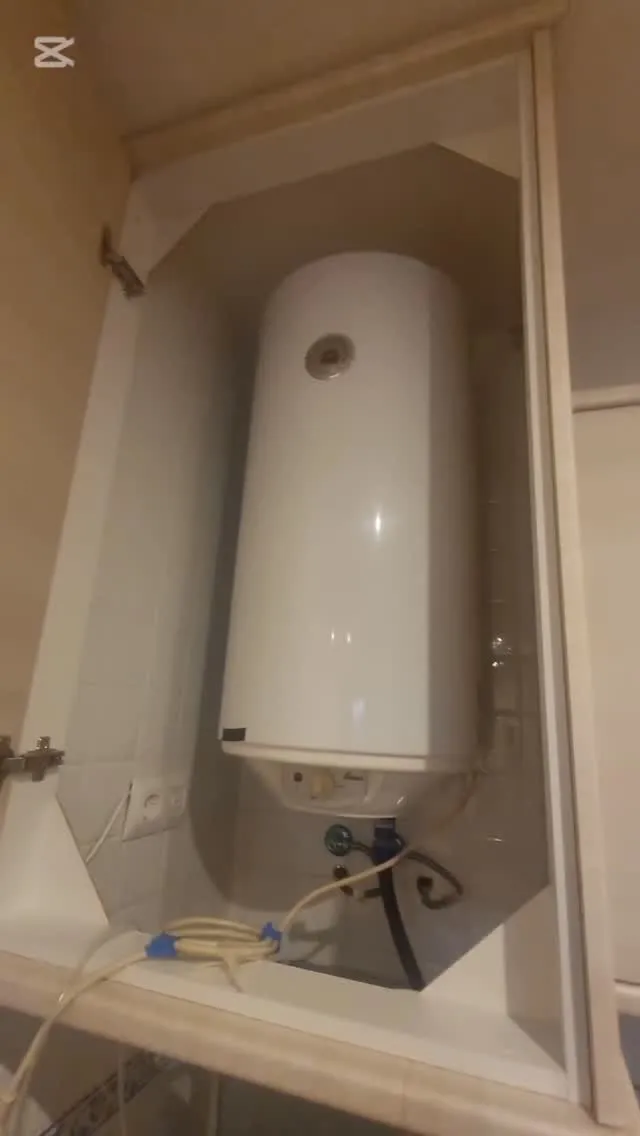 Cambio de termo encajonado en un mueble